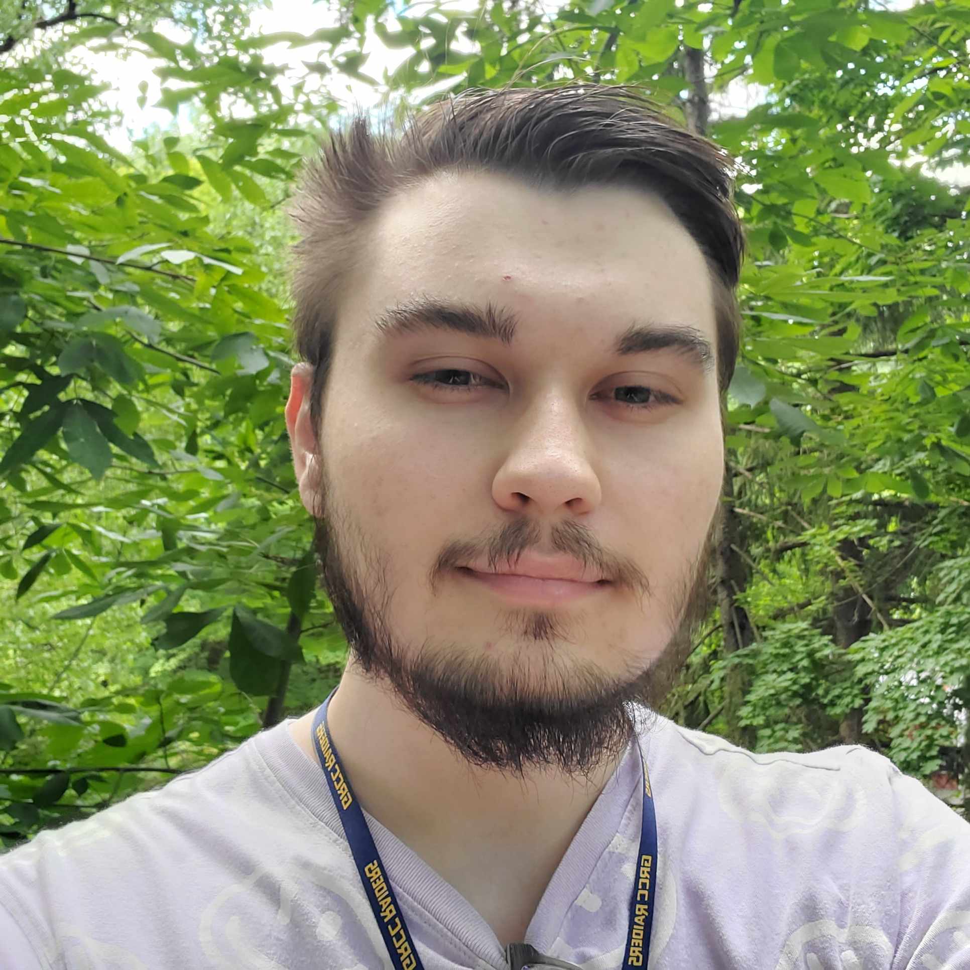 Image of Muhamed Otajagic inside a luscious forest